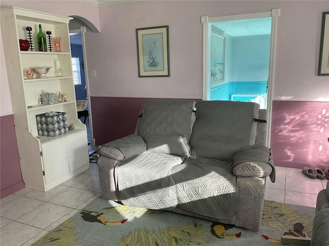 12077 Maryland Ave, Punta Gorda, FL 33955 - living room with ornamental molding and light tile patterned floors