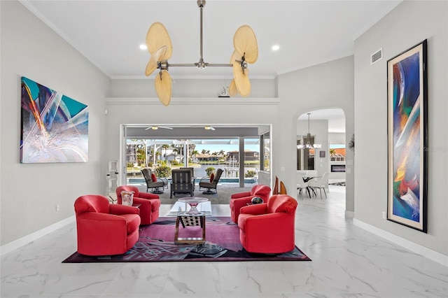3415 Tripoli Blvd, Punta Gorda, FL 33950 - living room with crown molding and a towering ceiling