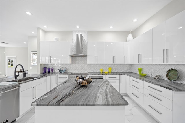 3415 Tripoli Blvd, Punta Gorda, FL 33950 - kitchen featuring white cabinetry, sink, wall chimney range hood, and dishwasher