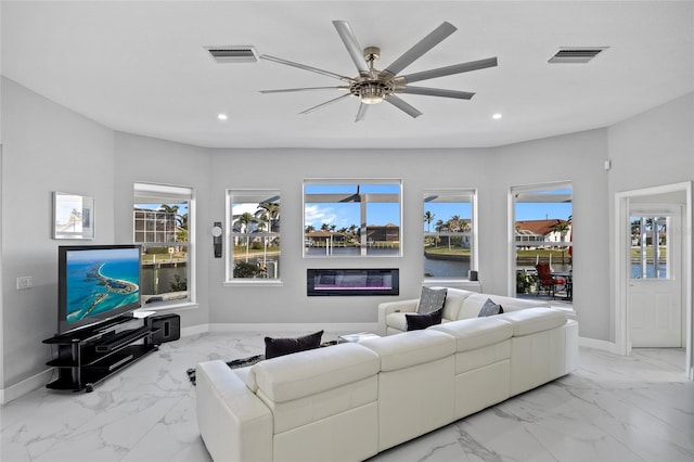 3415 Tripoli Blvd, Punta Gorda, FL 33950 - living room with a wealth of natural light and ceiling fan