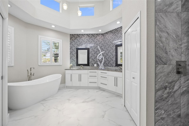 3415 Tripoli Blvd, Punta Gorda, FL 33950 - bathroom featuring shower with separate bathtub and vanity