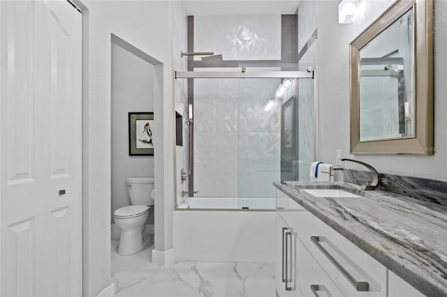 3415 Tripoli Blvd, Punta Gorda, FL 33950 - full bathroom featuring enclosed tub / shower combo, vanity, and toilet