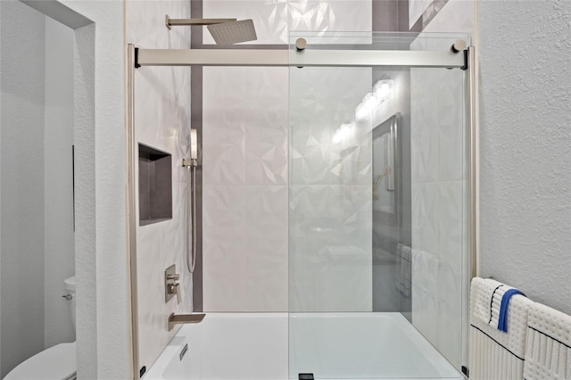 3415 Tripoli Blvd, Punta Gorda, FL 33950 - bathroom with toilet and bath / shower combo with glass door