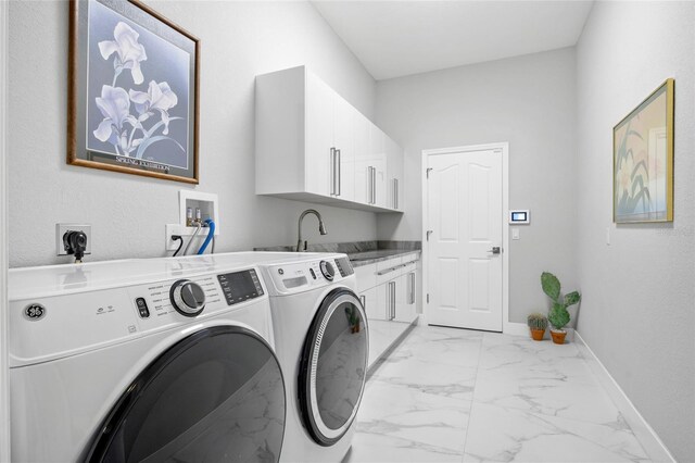 3415 Tripoli Blvd, Punta Gorda, FL 33950 - laundry area with washer and dryer, cabinets, and sink