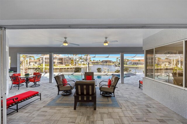 3415 Tripoli Blvd, Punta Gorda, FL 33950 - view of patio / terrace featuring a water view, ceiling fan, and glass enclosure