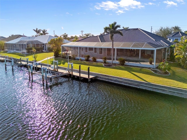 3415 Tripoli Blvd, Punta Gorda, FL 33950 - rear view of property with a water view, a lawn, and glass enclosure