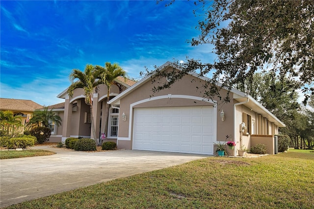 view of front facade with a garage and a front yard