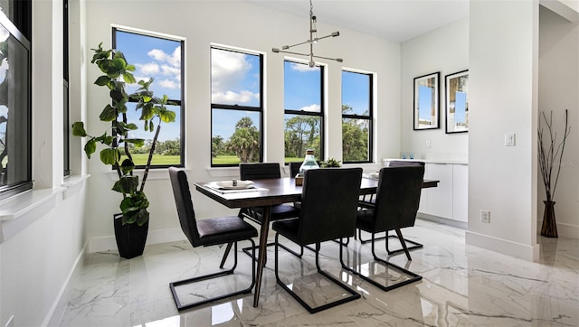 dining room featuring plenty of natural light