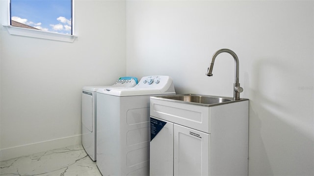 laundry area with washing machine and clothes dryer