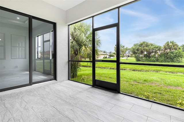 view of unfurnished sunroom