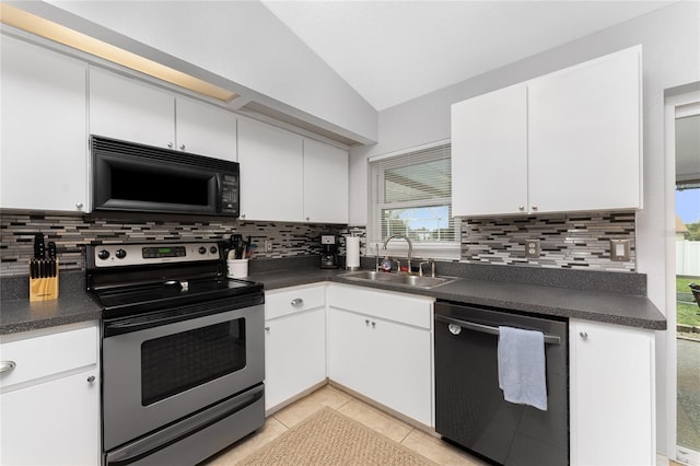 kitchen with dishwasher, lofted ceiling, sink, white cabinets, and stainless steel electric range