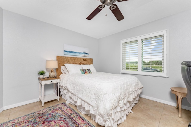 bedroom with light tile patterned flooring and ceiling fan