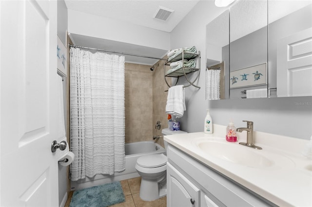 full bathroom featuring shower / bath combination with curtain, vanity, toilet, tile patterned floors, and a textured ceiling