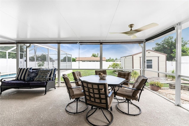 sunroom / solarium with ceiling fan