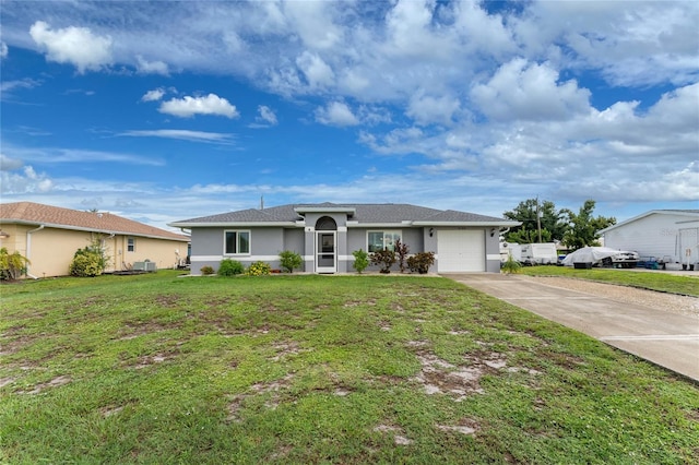 ranch-style home featuring a garage and a front lawn