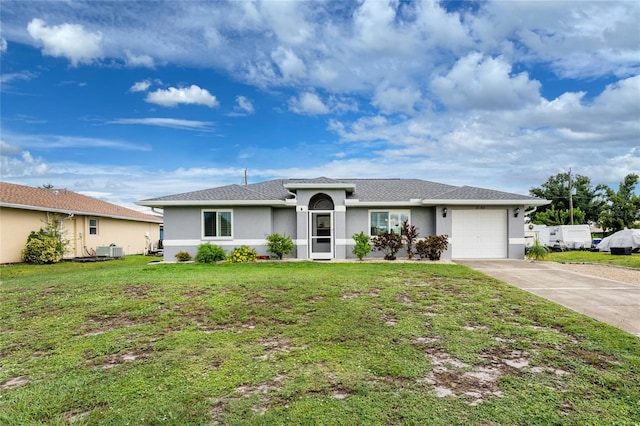 ranch-style house featuring a garage and a front lawn