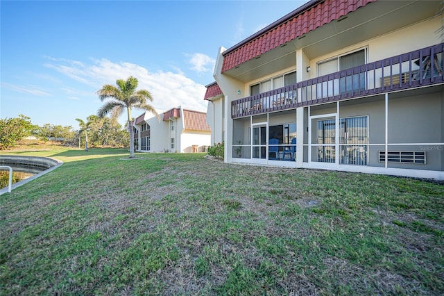 exterior space featuring a lawn