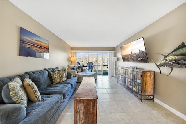 living room with light tile patterned flooring