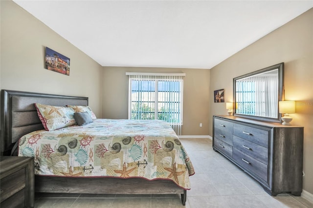 bedroom featuring light tile patterned flooring