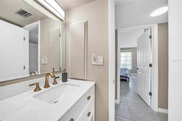 bathroom featuring vanity and tile patterned floors