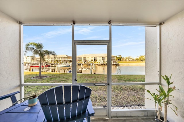 sunroom with a water view