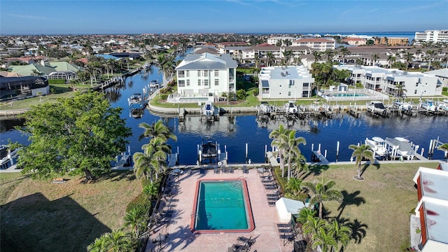 bird's eye view with a water view