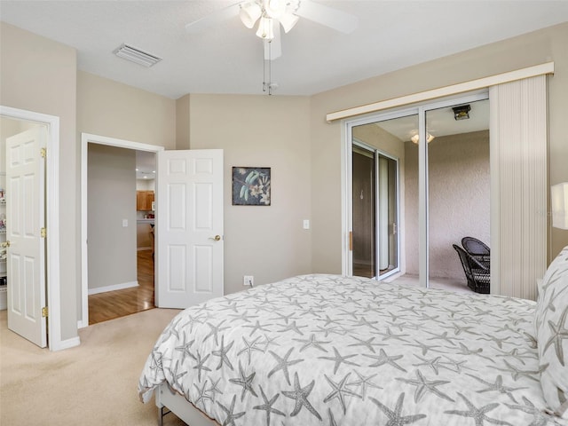 carpeted bedroom with a closet and ceiling fan