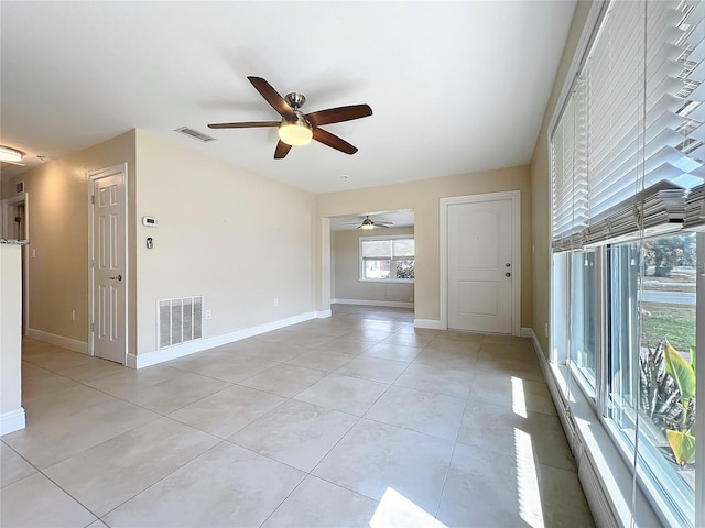 spare room with light tile patterned flooring