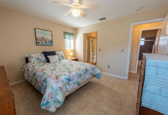 tiled bedroom featuring a closet and ceiling fan