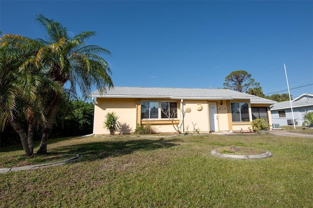 view of front of home with a front yard