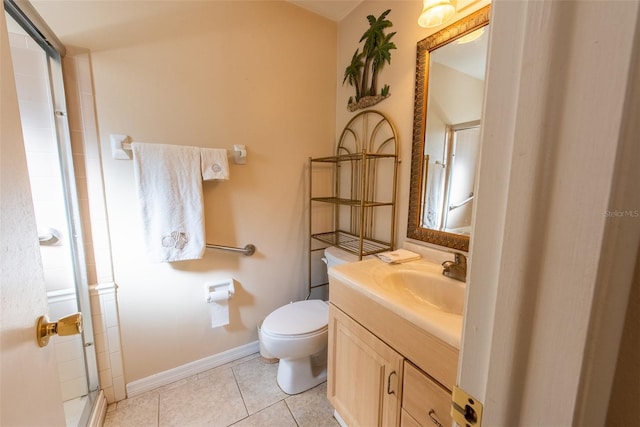 full bath with toilet, vanity, baseboards, tile patterned floors, and a stall shower