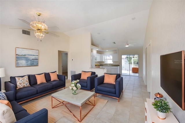 tiled living room with vaulted ceiling and ceiling fan