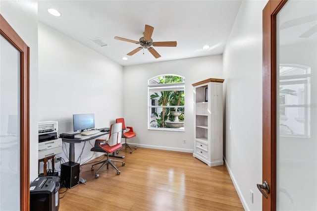 office featuring ceiling fan and light wood-type flooring