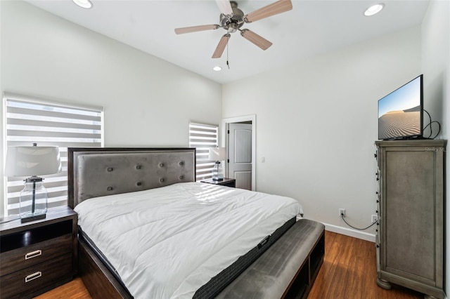 bedroom with dark wood-type flooring and ceiling fan