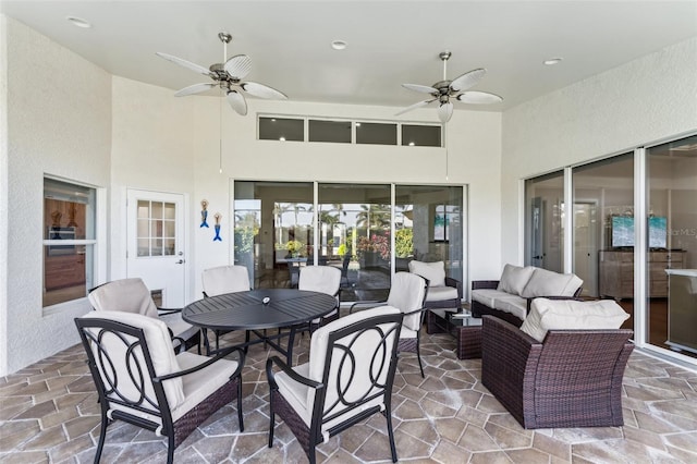 view of patio featuring ceiling fan and outdoor lounge area