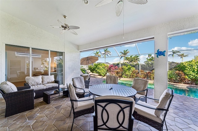 exterior space featuring lofted ceiling and ceiling fan