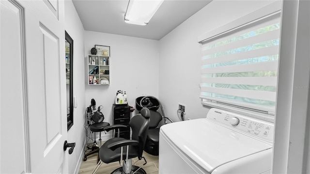 washroom featuring washer / clothes dryer and hardwood / wood-style floors