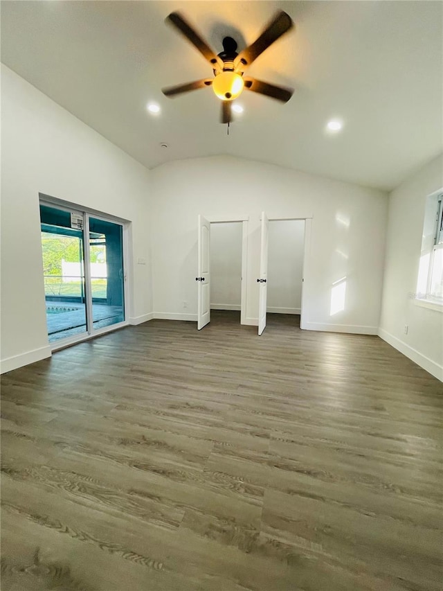4128 Durant St, Port Charlotte, FL 33948 - empty room featuring plenty of natural light, ceiling fan, lofted ceiling, wood finished floors, and recessed lighting