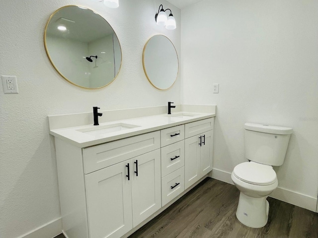 4128 Durant St, Port Charlotte, FL 33948 - bathroom featuring double vanity and wood finished floors