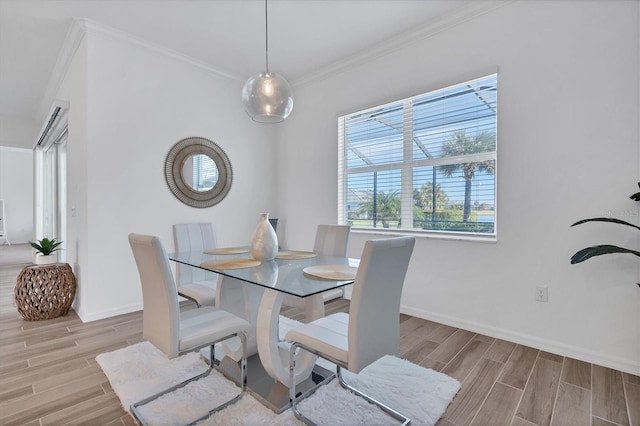 dining room featuring ornamental molding