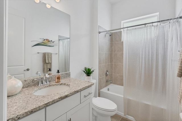 full bathroom with vanity, toilet, and shower / tub combo with curtain