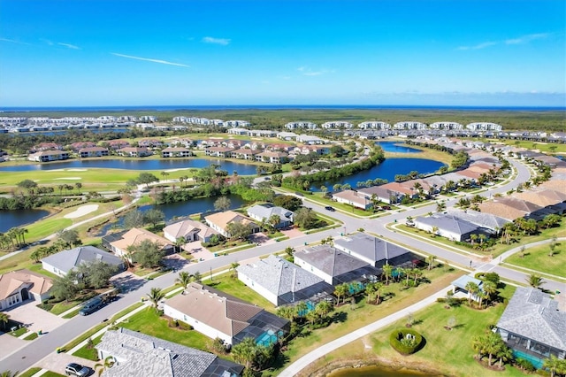 drone / aerial view with a water view