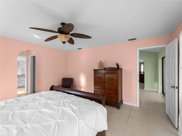 bedroom featuring light tile patterned floors and ceiling fan