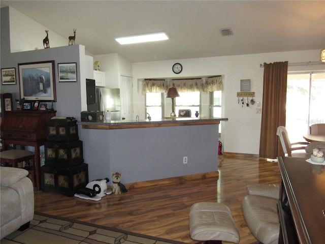 living room featuring dark hardwood / wood-style floors