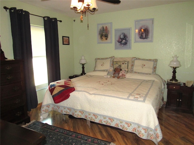 bedroom featuring dark hardwood / wood-style floors