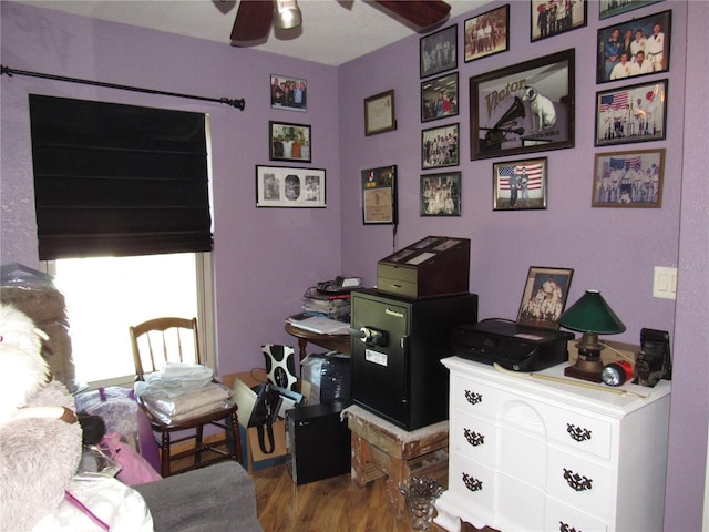 office area with hardwood / wood-style flooring and ceiling fan