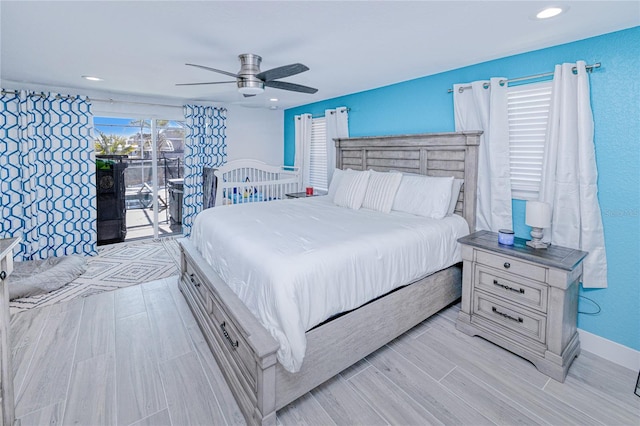 bedroom featuring access to exterior and ceiling fan