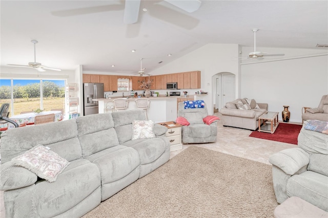 living room with vaulted ceiling and ceiling fan