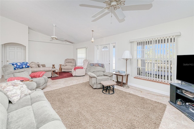 living room with lofted ceiling and ceiling fan