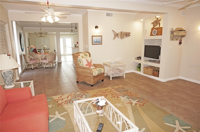 tiled living room with ceiling fan with notable chandelier and ornamental molding